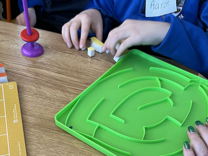 Child playing with STEM toys